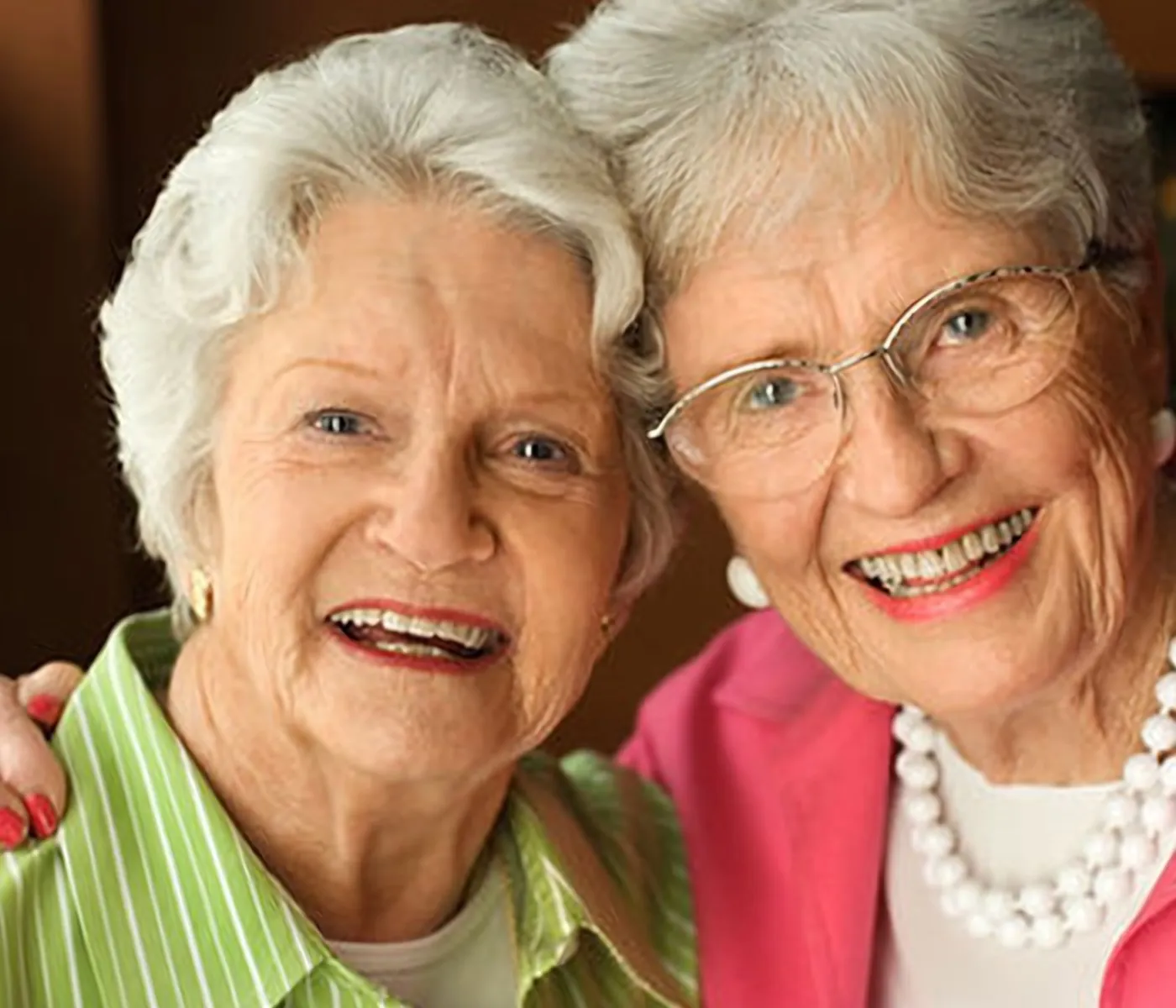 Two smiling senior women
